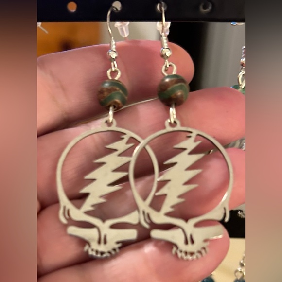Grateful Dead Jewelry - Grateful Dead Stealie hanging earrings with blue/brown bead. Artisan handmade